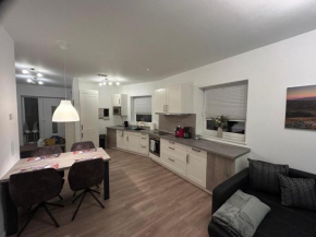 Moderne Ferienwohnung Green Garden mit Garten und Stellplatz